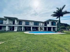 Umhlanga 7 sleeper with pool, garden and sea views